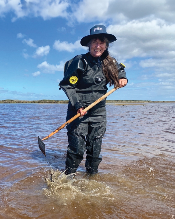 Mary de Winton working at Waituna Lagoon